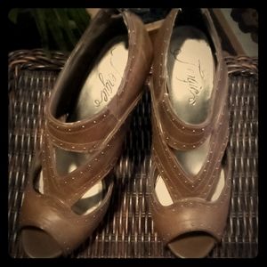 Pair size 8 of "Fergie" studded  high heels